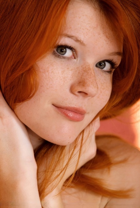 Redhead glamour model Mia Sollis posing in black lingerie in teasing manner 54641582