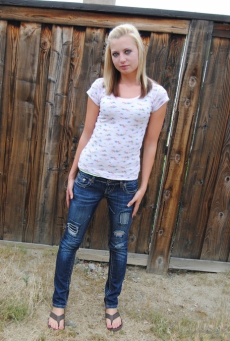 Horny Tiny Tiff showcases her small boobs and bald vagina outdoors 61944454