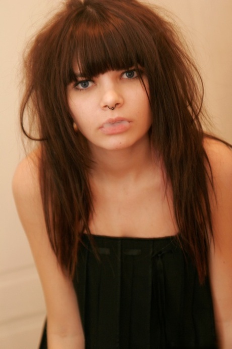 Petite girl Kaira 18 smokes while getting totally naked behind a closed door 32702246
