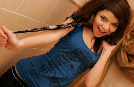Adorable teen Kaira 18 bites down on greenery during a safe for work shoot 78713296